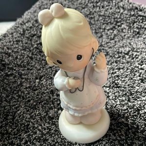 Precious Moments “always listen to your heart” figurine